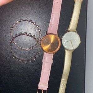 2watches and pair of earrings